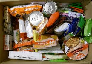 Box containing Japanese food.