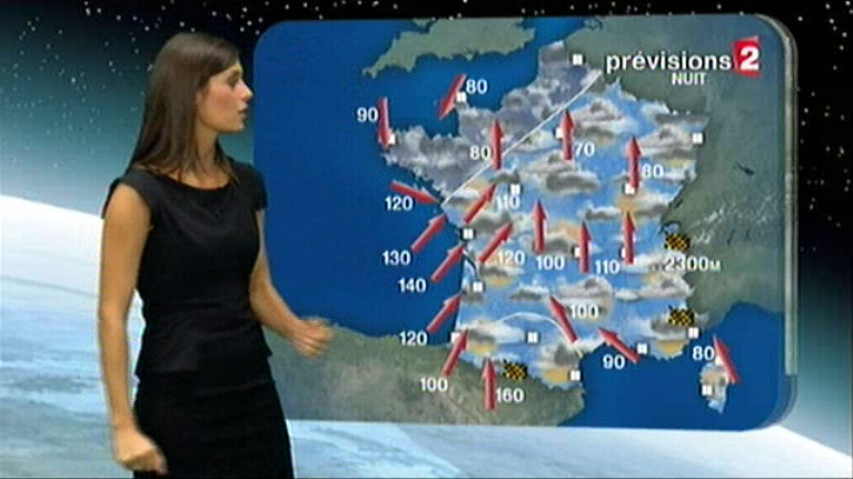 Pretty weathergirl showing the oncoming cataclysm [Hurricane Xynthia]