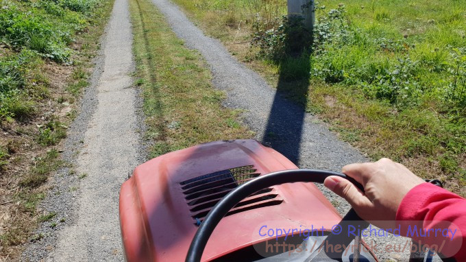 Mowing the driveway.