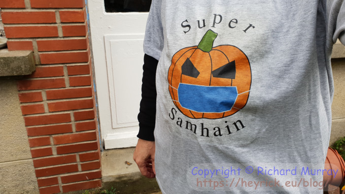 A T-shirt I made myself featuring a carved pumpkin with a mask