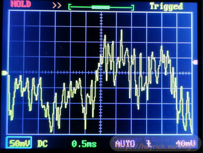 A photo of the oscilloscope's display